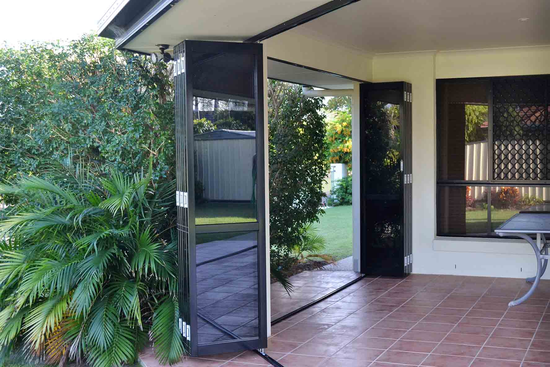 Black Stacking Slider Door on a House Patio