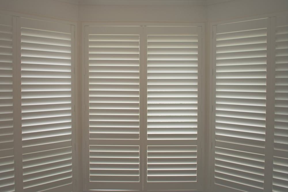 A White Closed Plantation Shutters